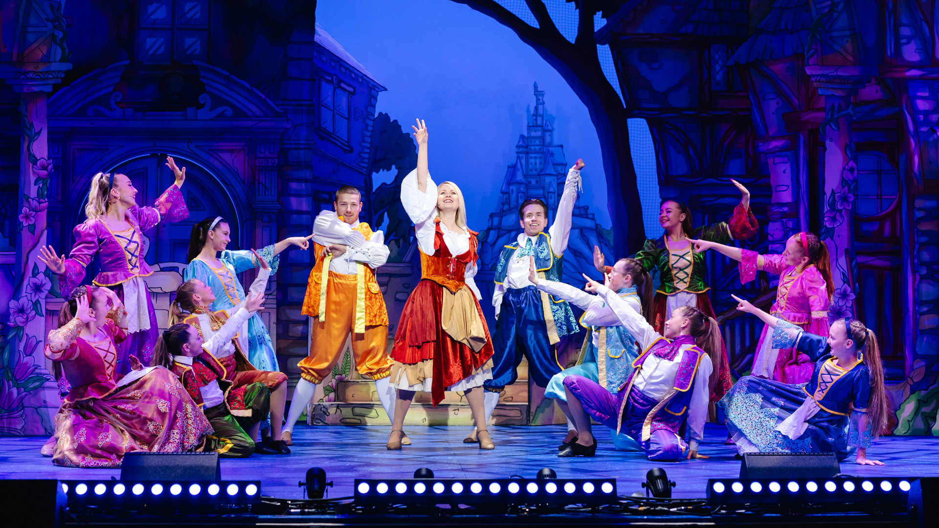 Group of people dancing on stage