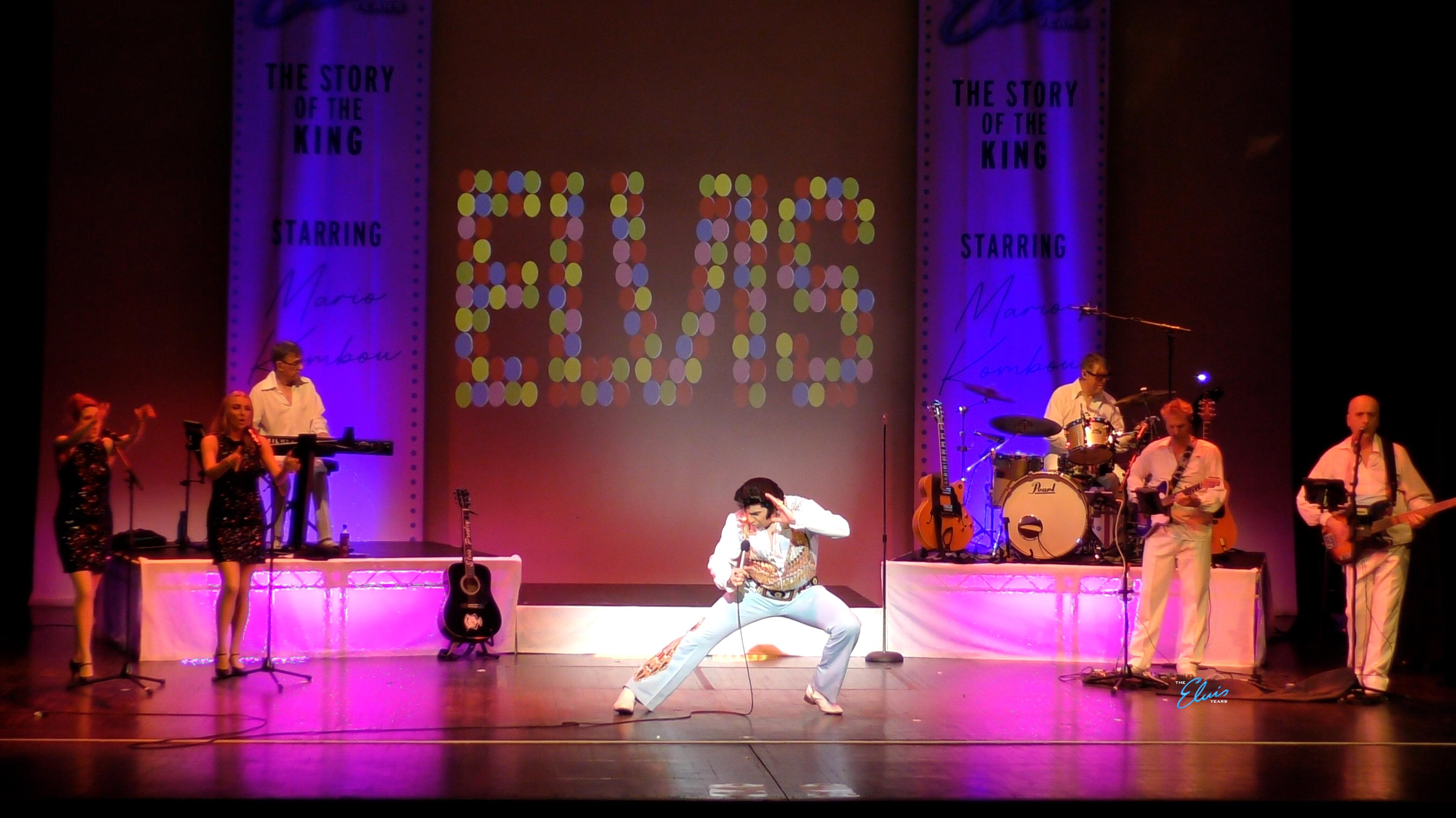 Man singing and lunging on stage 