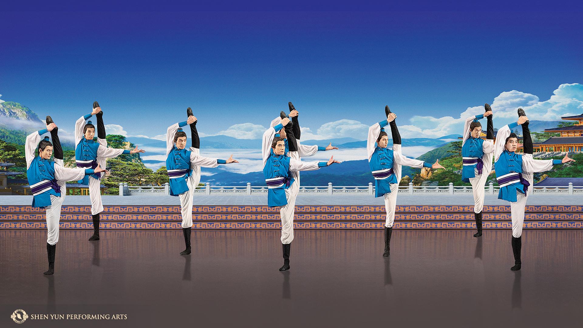 Group of dancers kicking leg in the air