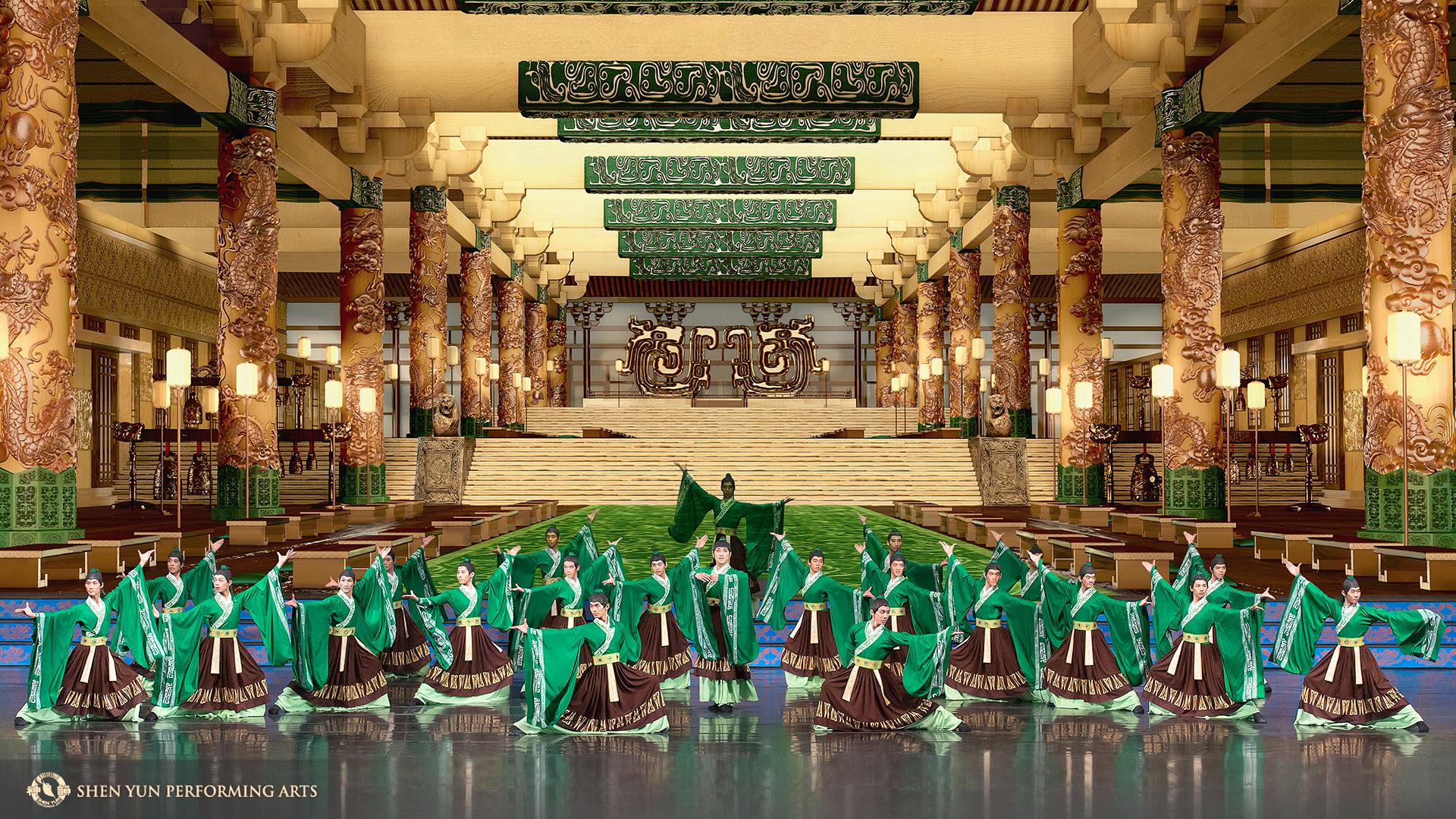 Stage full of dancers dressed in green and brown