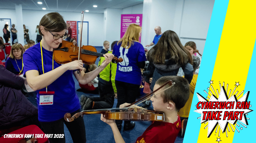 image of adult and child playing a violin