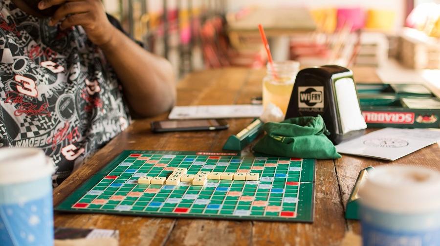 image of a person playing a board game