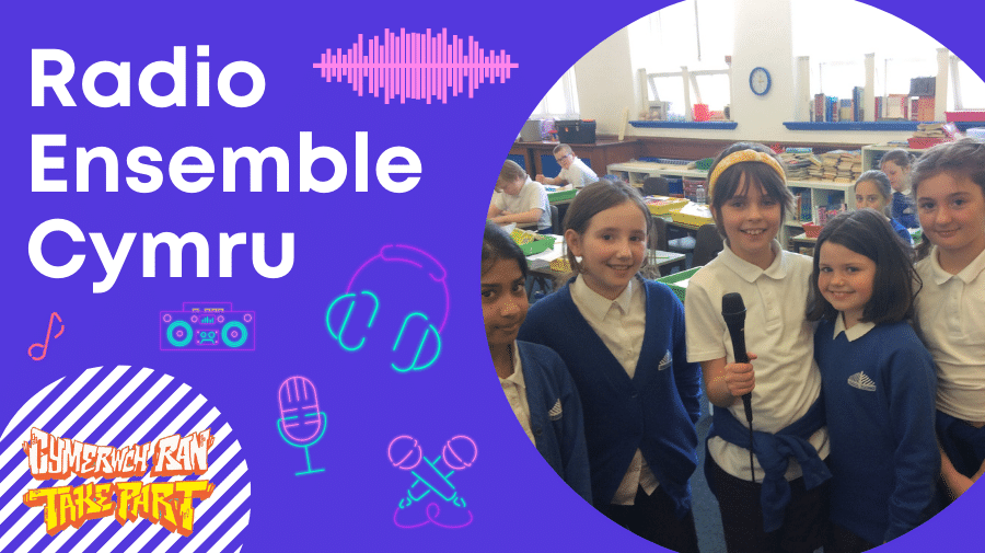 a photo of school pupils in a class holding radio microphones  