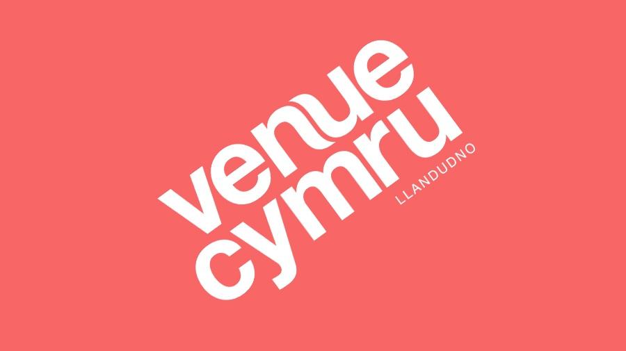 image of the venue cymru logo on a pink background
