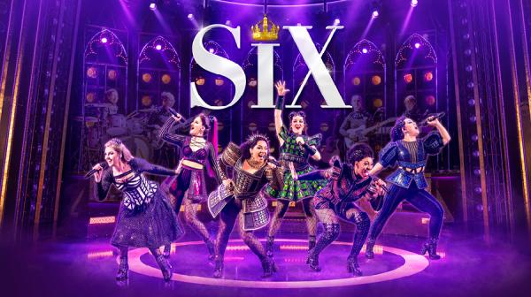 The six ladies in costume underneath the title logo for the show