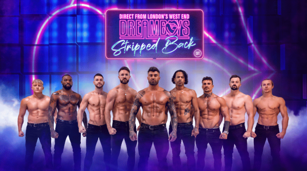 Topless men in front of a neon pink and blue background.