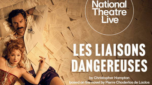 an older woman in a red corset lies across the legs of a younger man wearing a white shirt. Under them, piles of parchment paper. 